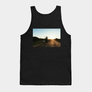 Silhouette of Boy Riding Bicycle at Sunset in Burmese Countryside Tank Top